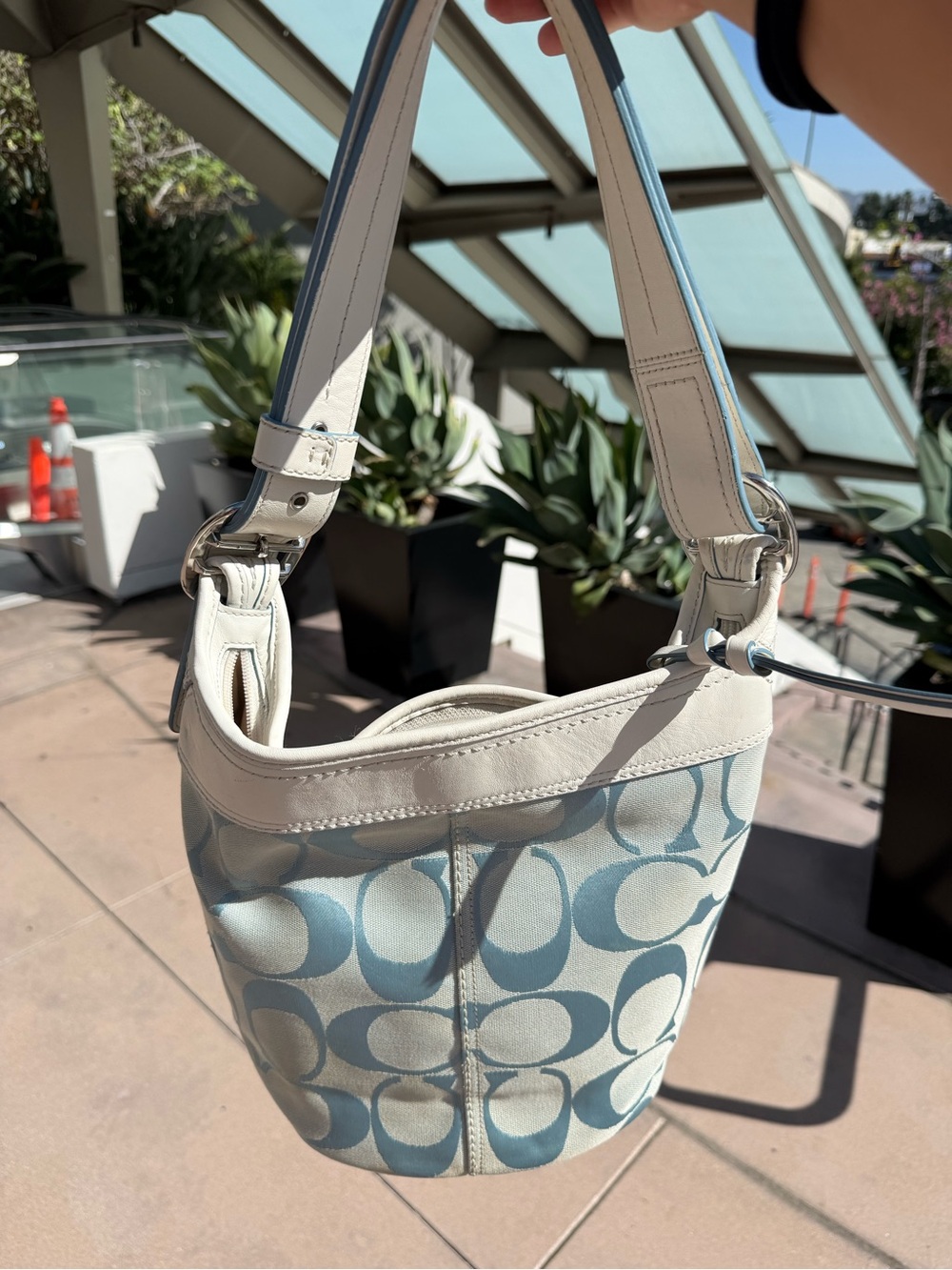 Coach blue and cream bucket bag with light blue C logo pattern